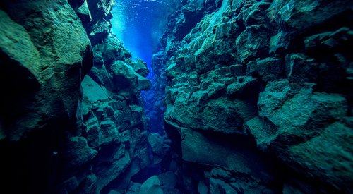 Underwater view of where two tectonic plates meet in Silfra Iceland