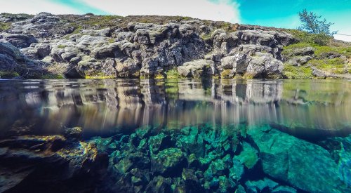 Silfra - absolutely clear blue water between continental plates in Iceland