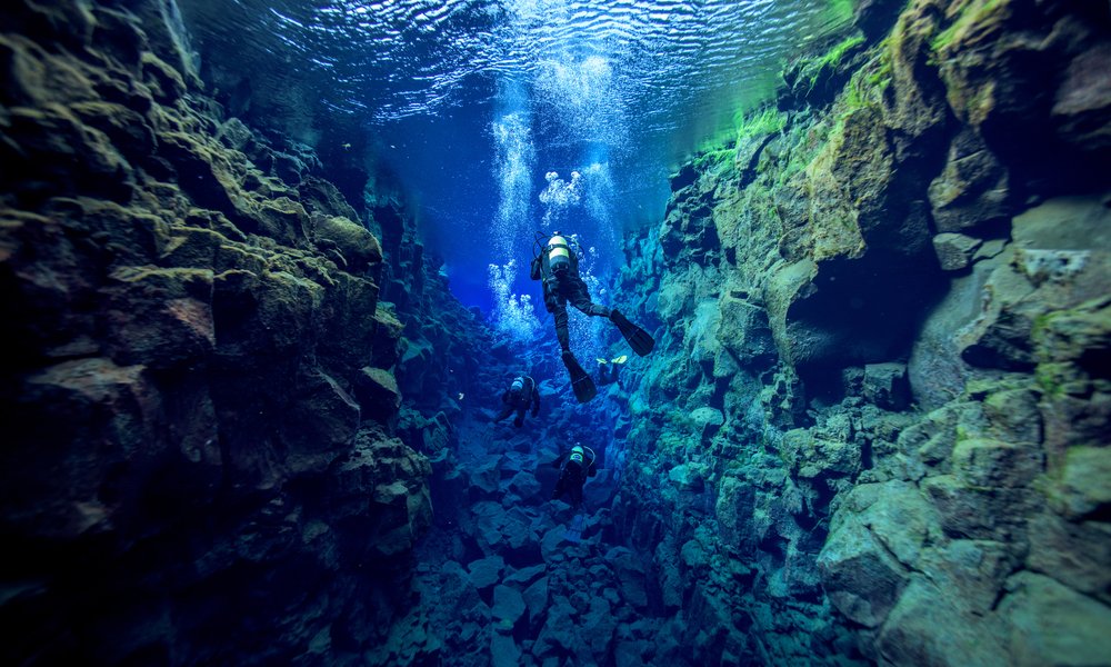 Underwater photo of a scuba diver in Silfra Fissure